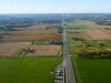 A Typical Ontario Road Through the Hills and Fields