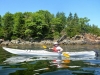 Paddling round the headland to Owls Head